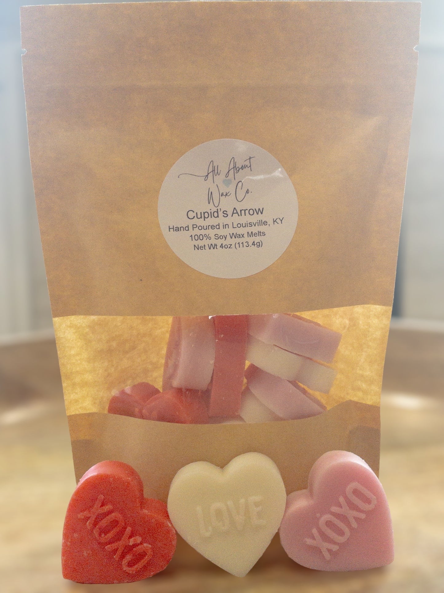 Cupid’s Arrow (Prosecco and Plum), white, pink, and red, heart shaped, up close