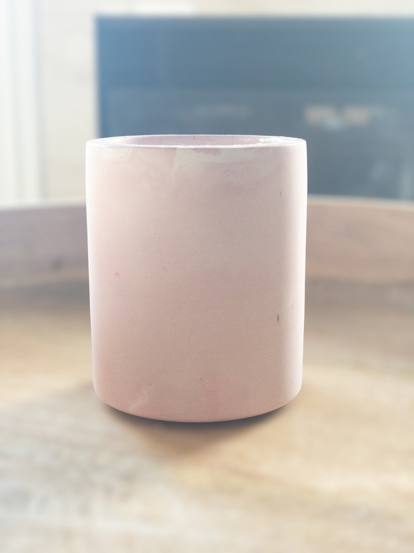 Cupid’s Arrow (Prosecco and Plum), wooden wick, concrete vessel, pink and white, left